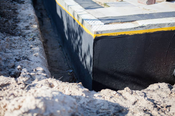 Professional Exterior Waterproofing technician working in Barboursville, VA